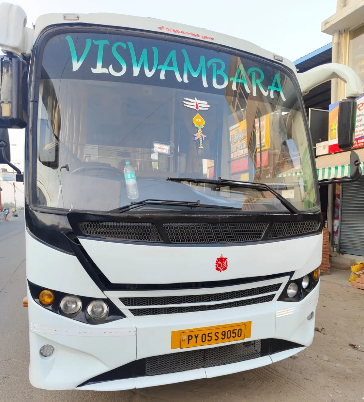 35 seater luxury van interior with plush seats and screen